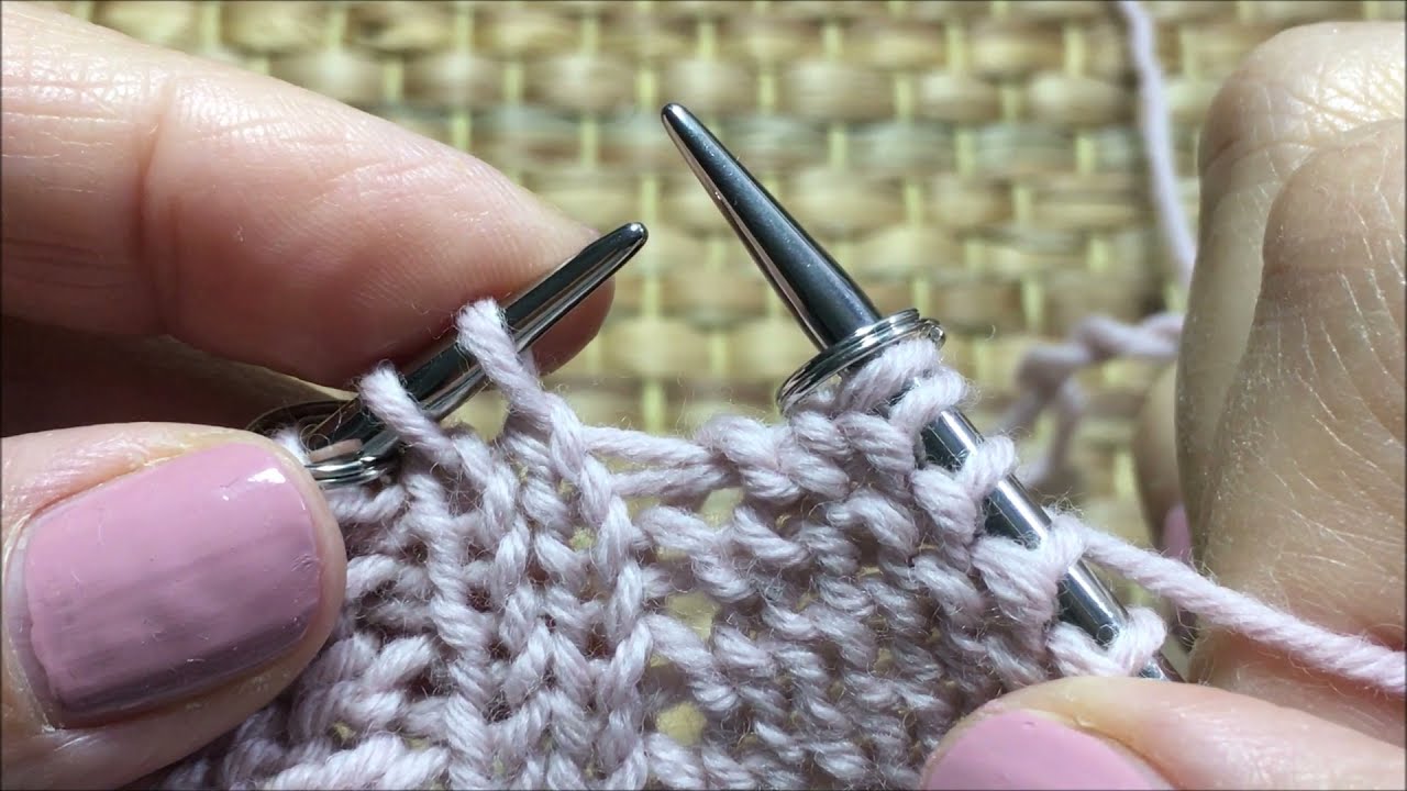 Motivo Raglan ai ferri con l'aumento sollevato