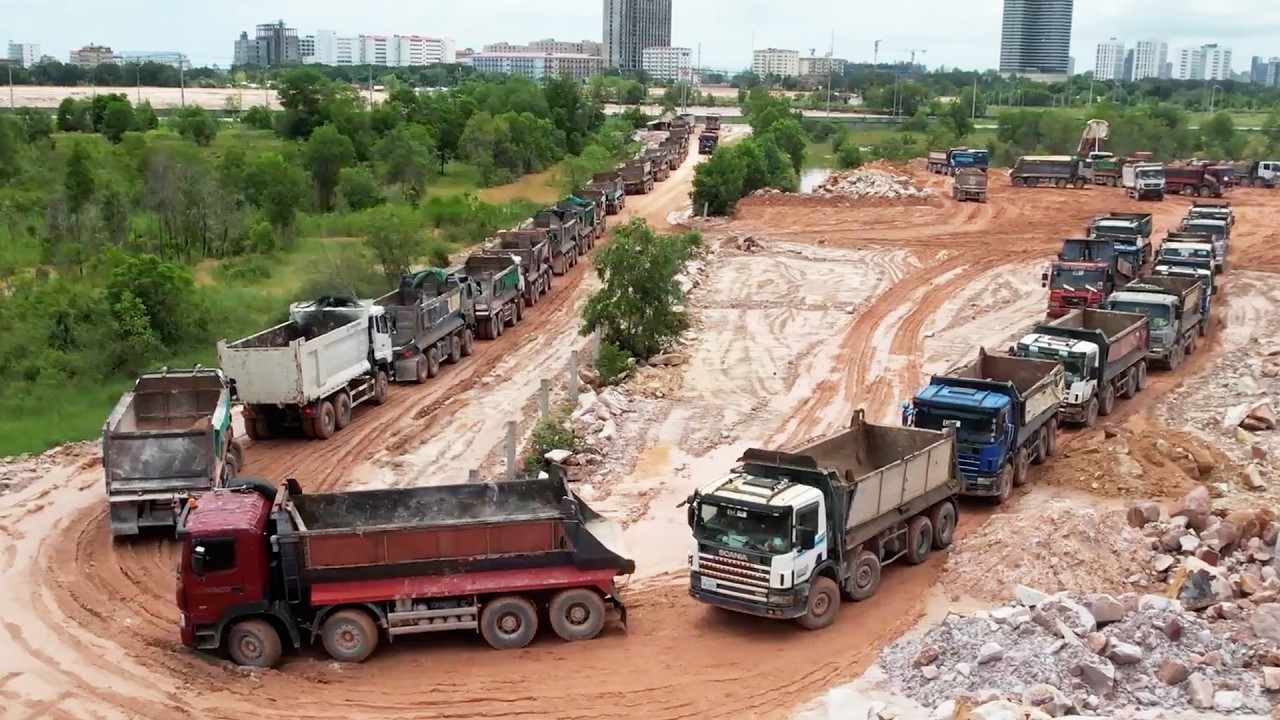 Wonderful 300 Dump Trucks Management Transport & Unloading Stones, Dozer Pushing Fill in Water