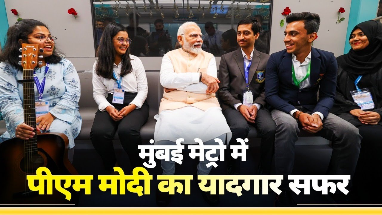PM Modi interacts with passengers on board Mumbai Metro
