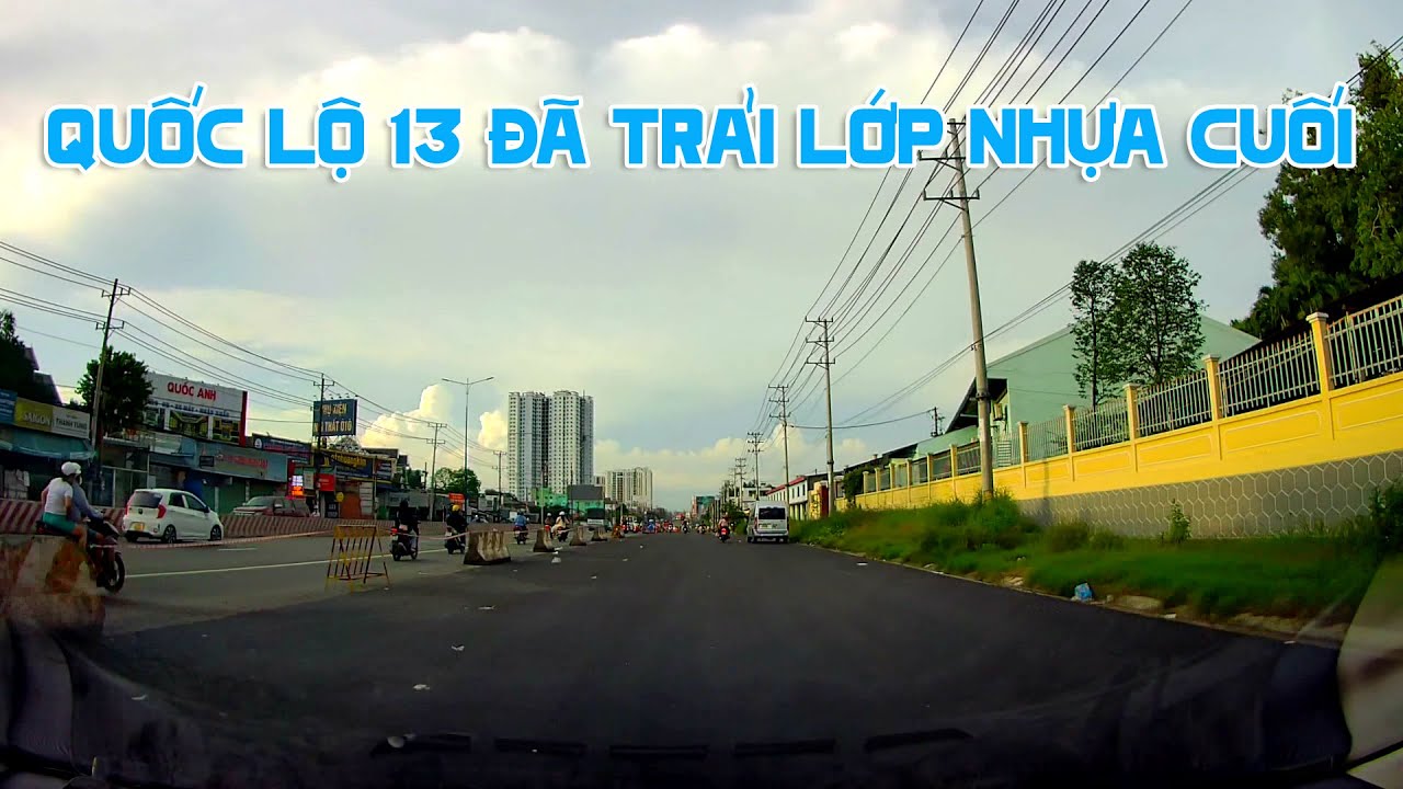 Trải lớp nhựa cuối dự &aacute;n Mở rộng QL13 qua B&igrave;nh Dương
