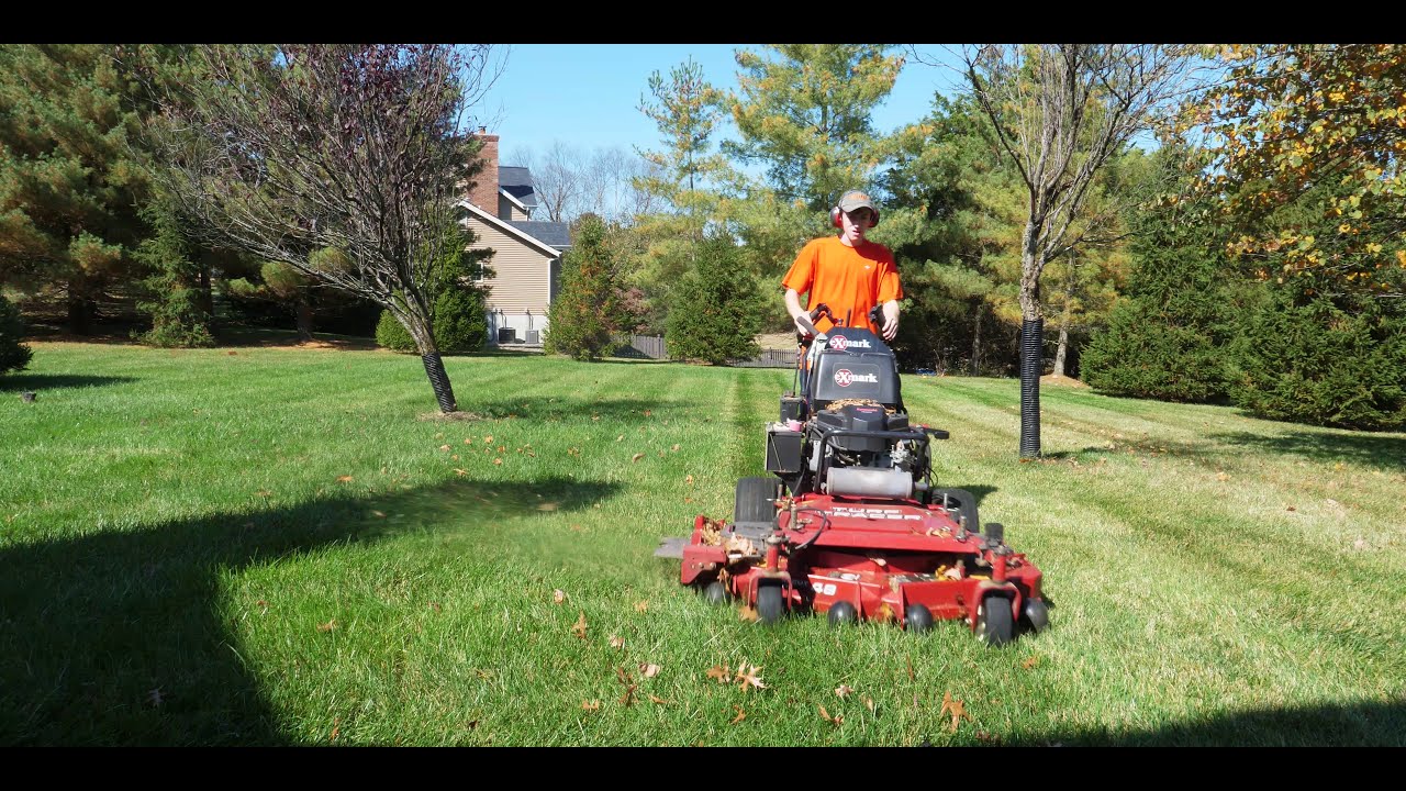 Mowing back yard with Exmark Turf Tracer 48"