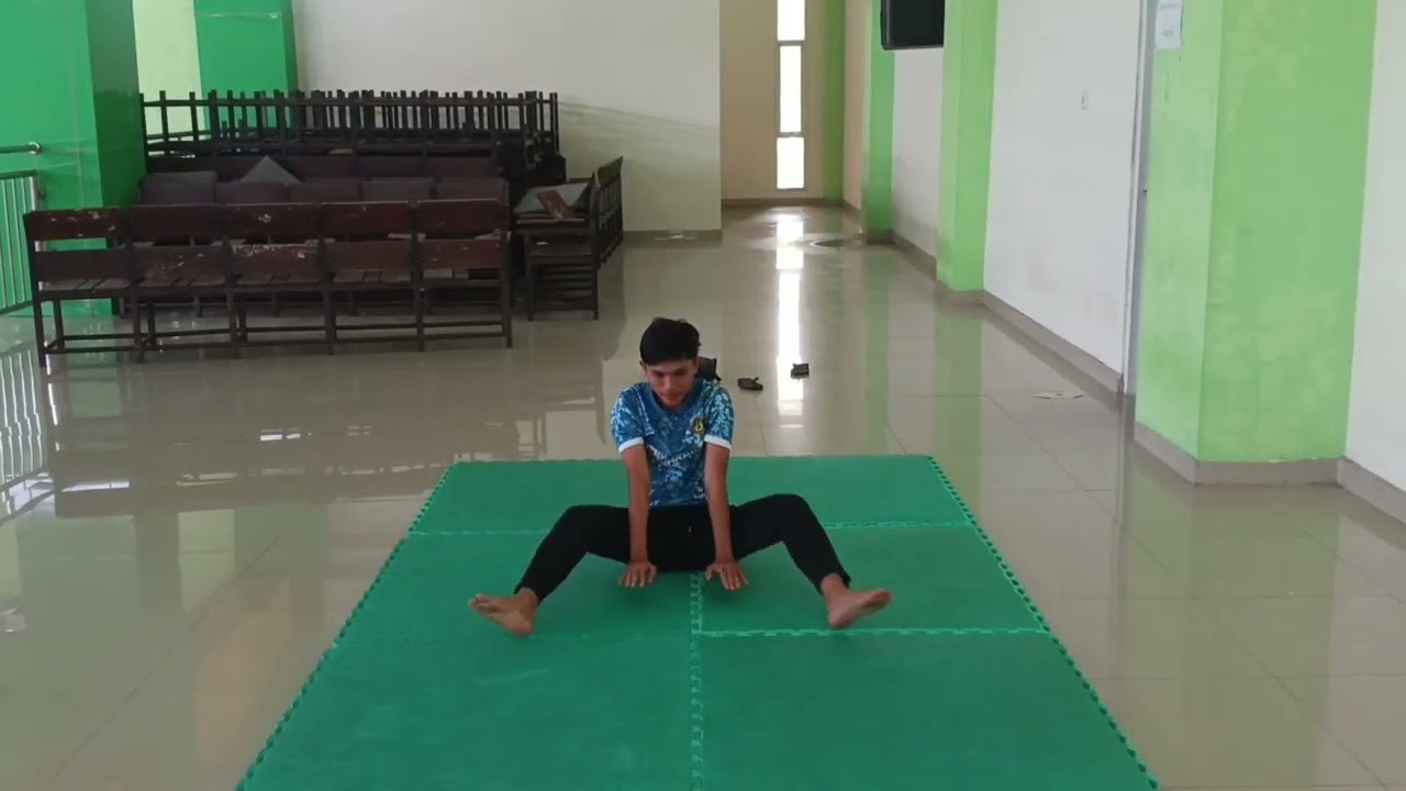 cara melakukan rolling depan v