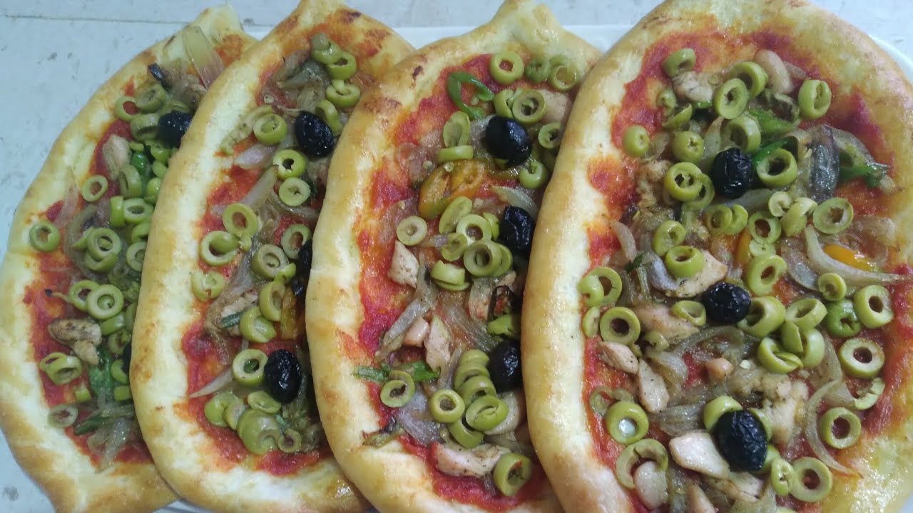 قوارب البيتزا بطريقة سهلة وحشوة اقتصادية😋😋😋😋😋