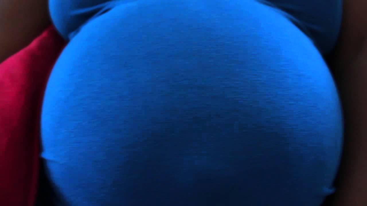 Baby gives dad Hi Five from the womb!