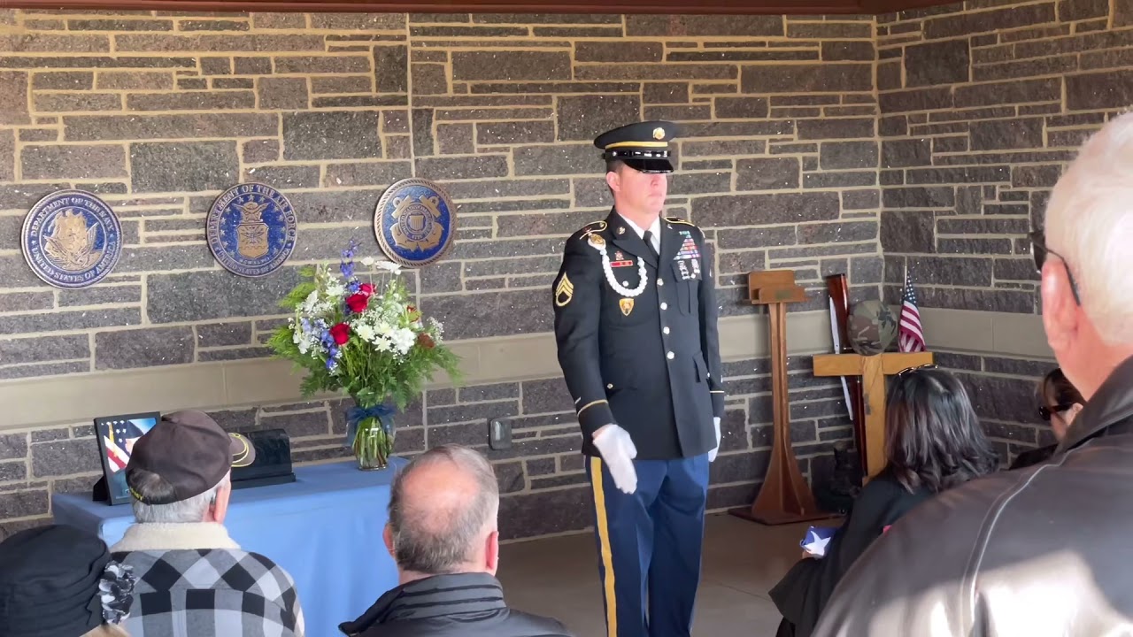 Attending the military funeral service of deceased veterans friend,Veterans Cemetery Desmoines, Iowa