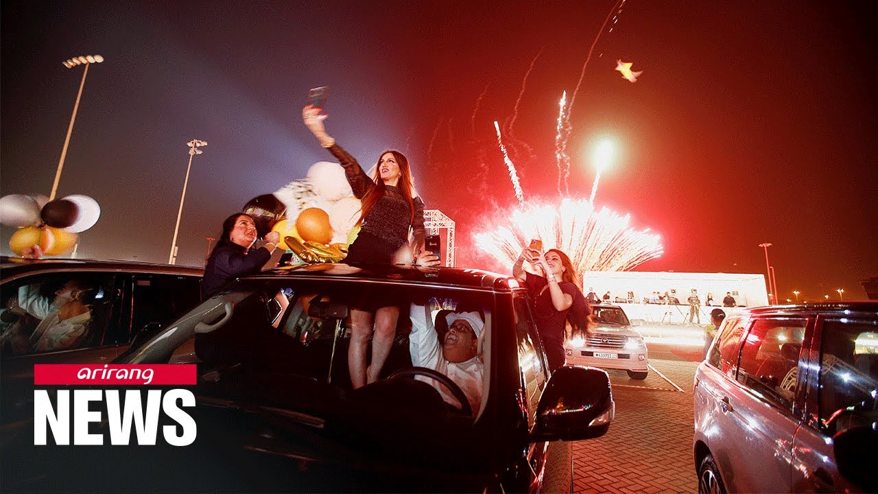 Students at school in Bahrain receive their degree at drive-in graduation ceremony