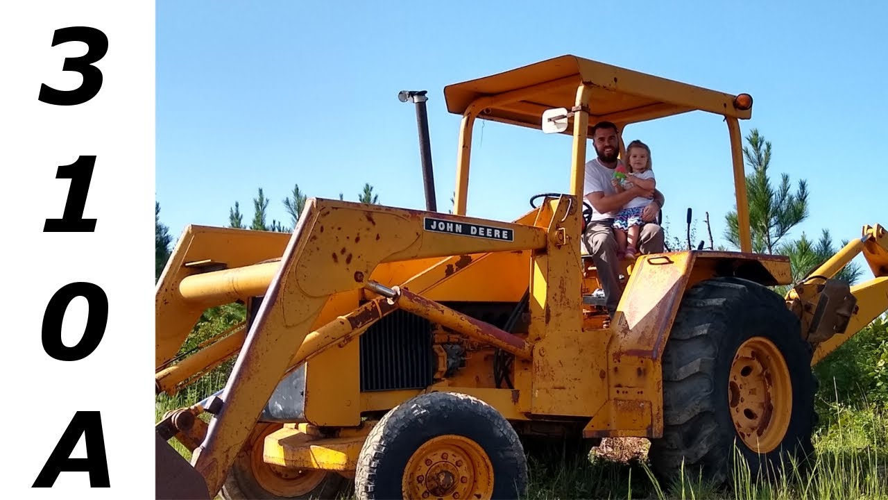 Ремонт гидравлической утечки в экскаваторе-погрузчике John Deere 310A