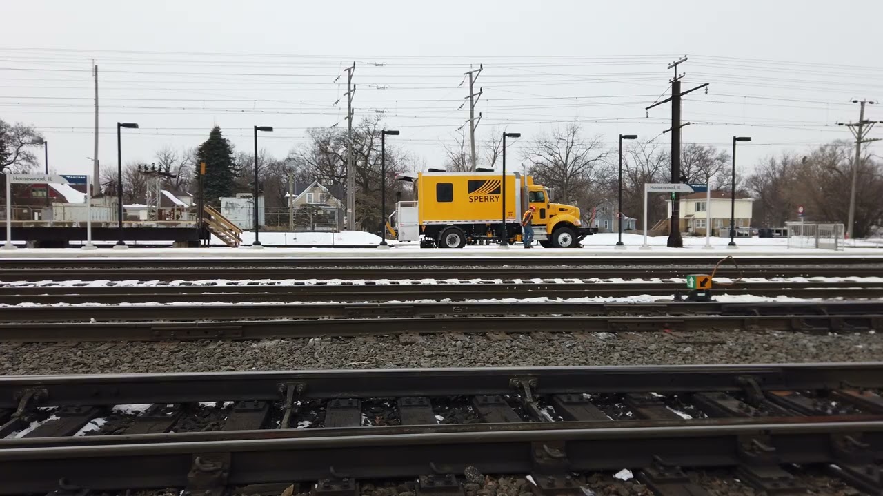 Sperry Hi-rail is removed from the track after inspections are done.