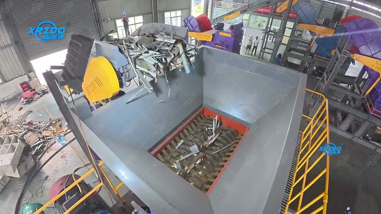 Mixed waste shredder metal scrap shredding machine double shaft shredder with detachable cutter.