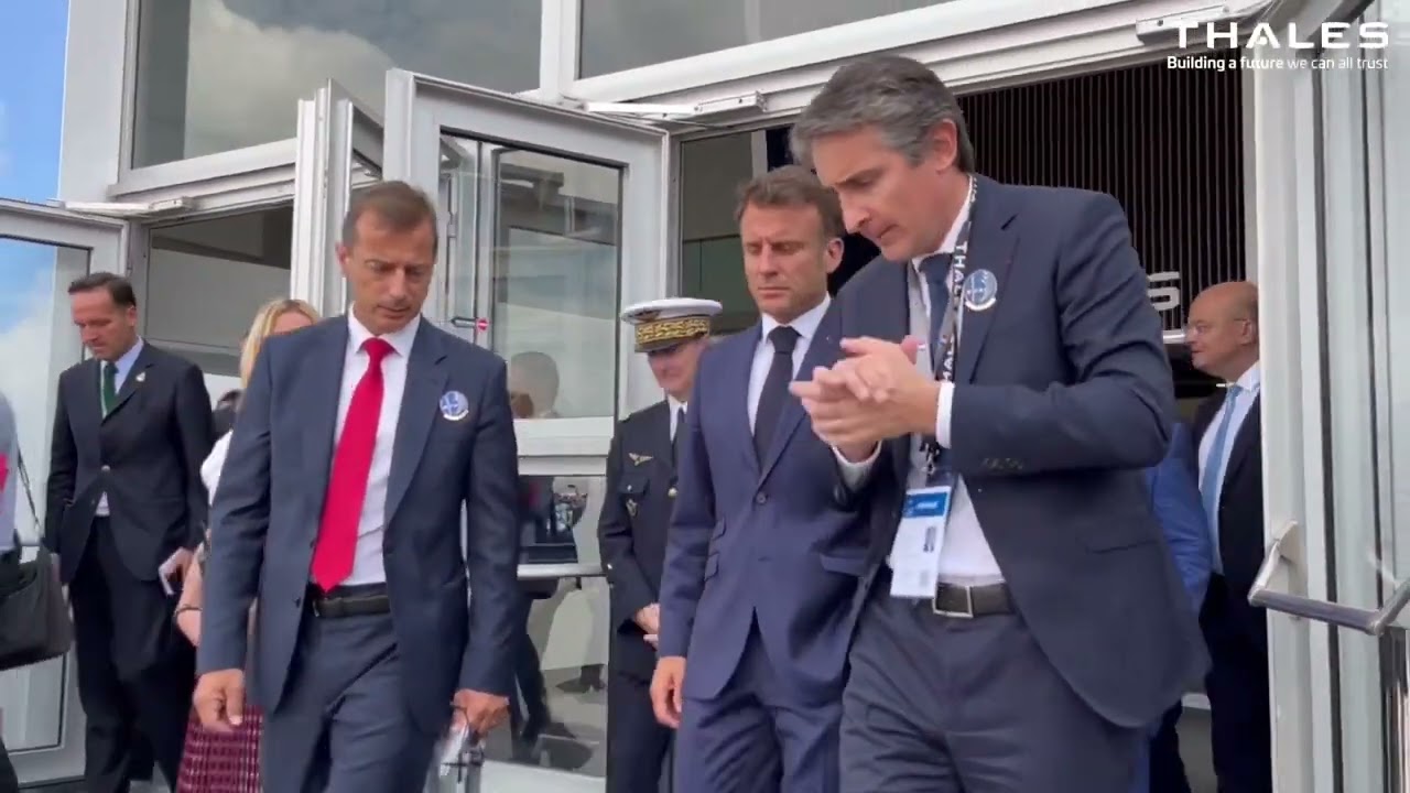 Patrice Caine hosts French President Emmanuel Macron at the Thales stand