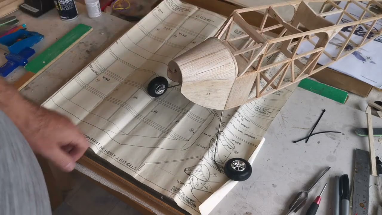 Installing the undercarriage :Mercury Matador vintage rc plane.
