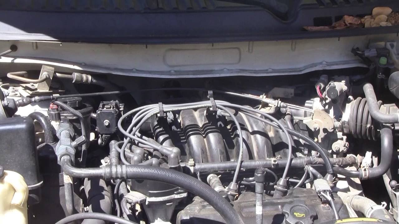How to replace the PCV valve on a 2002 Nissan Quest