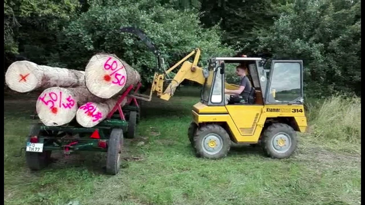 Holz auf Langholzwagen verladen, Kramer Allrad Unicat 314