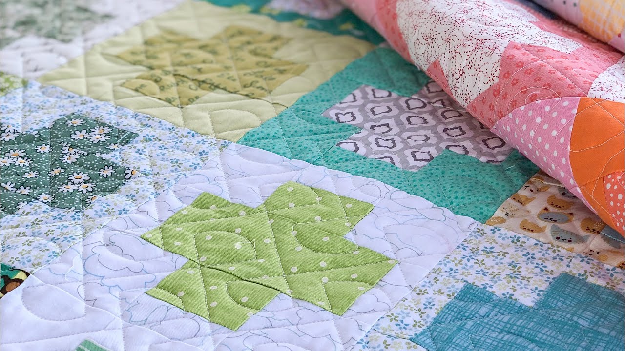 Completed Quilty Love Plus quilt and a Bookcase quilt - December 21, 2022
