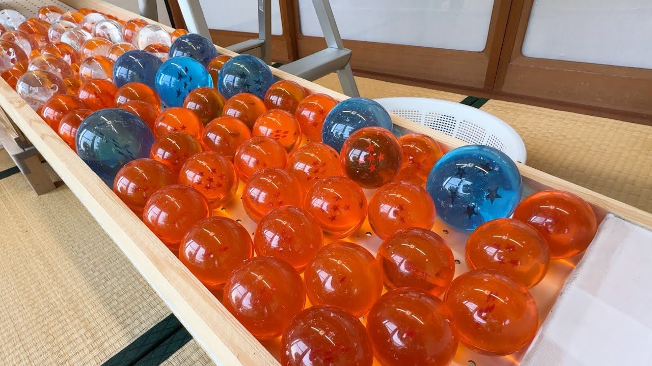 I made a marble run course using a large clay pipe to roll dragon balls and cat balls. #ASMR
