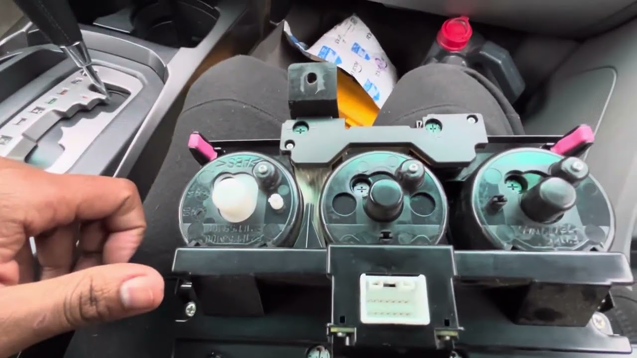 Replacing light bulbs on climate controls and LCD panel on a 2006 Toyota 4Runner.