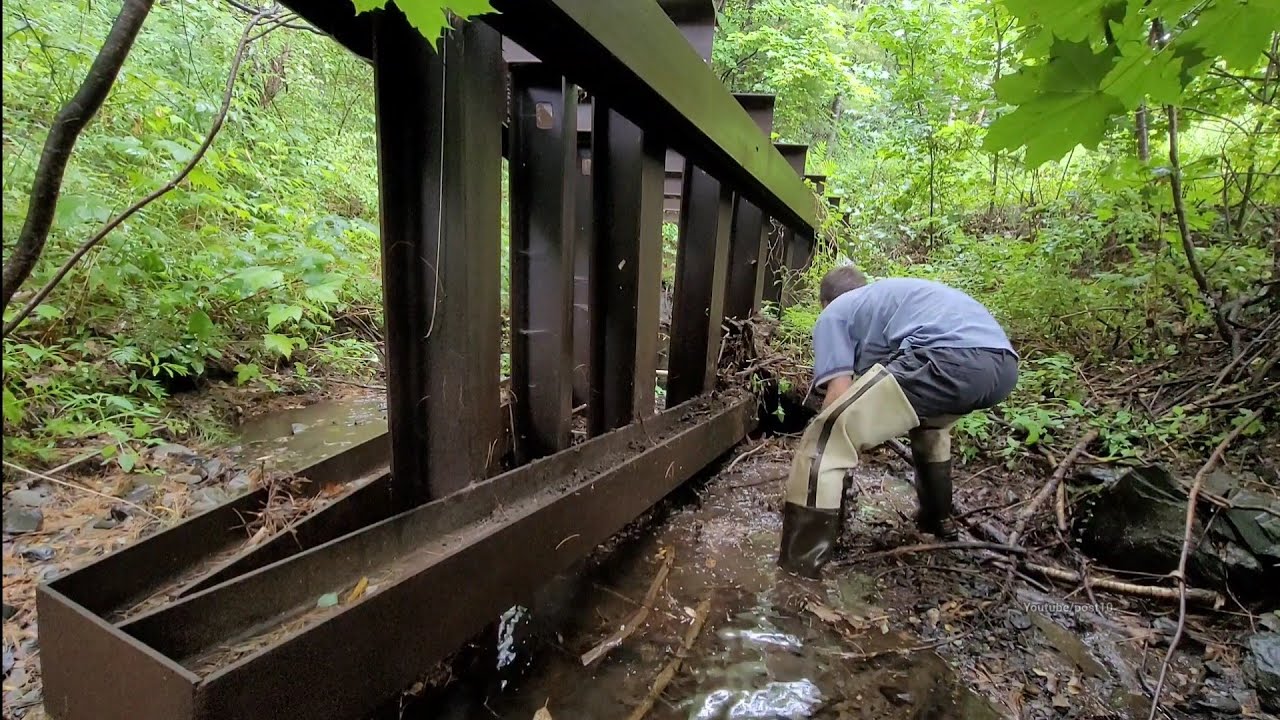 Unclogging Massive Triangular Trash Rack In Vermont