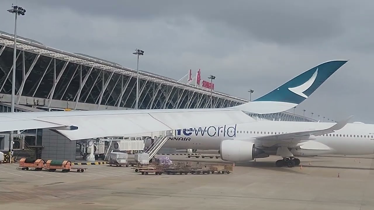 Boarding Cathay Pacific CX flight at Terminal 2 T2 Shanghai Pudong PVG International Airport to HKIA