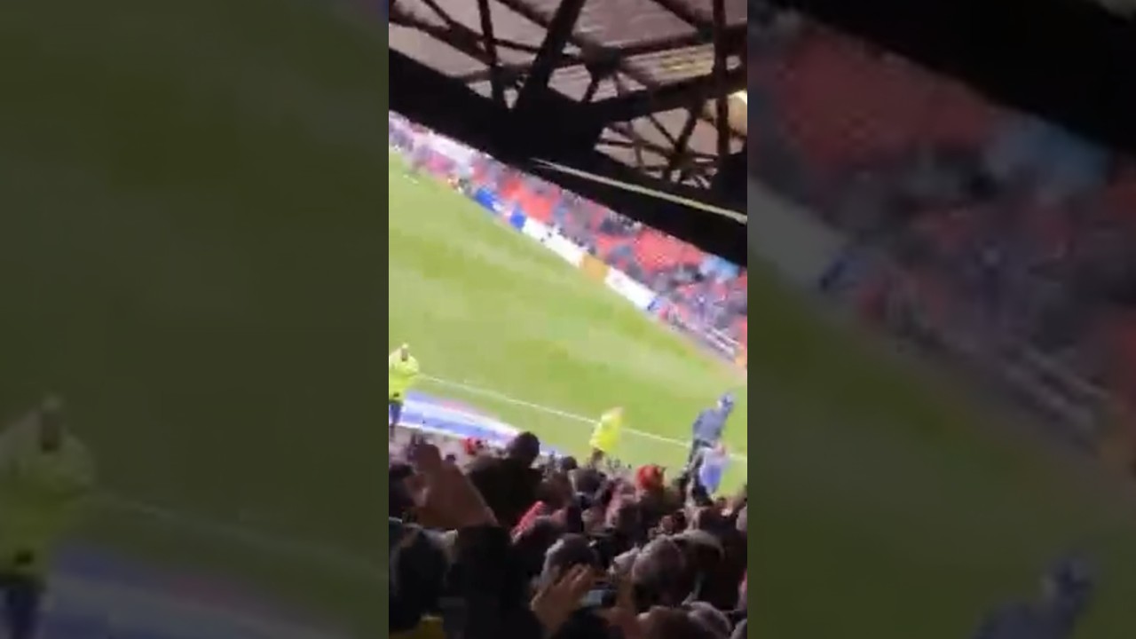 &ldquo;CHAMPIONS AGAIN OL&Eacute; OL&Eacute;&rdquo; - Wrexham AFC fans at Grimsby Town