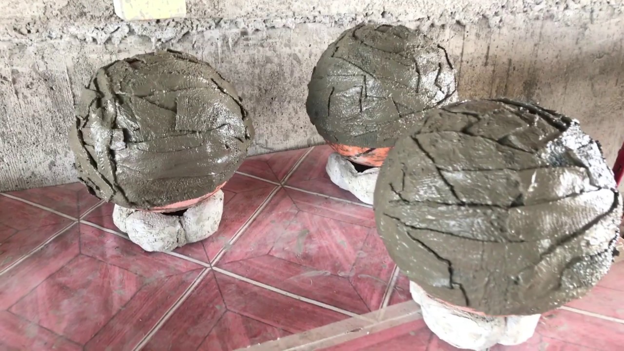 DIY: Turn Fabric & Cement Into Bandage Orbs & Spherical Garden Planters