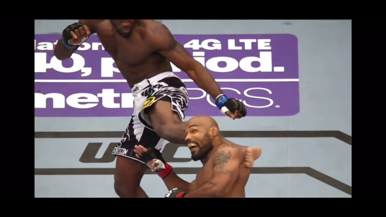 Yoel Romero eats huge head-kick like its nothing