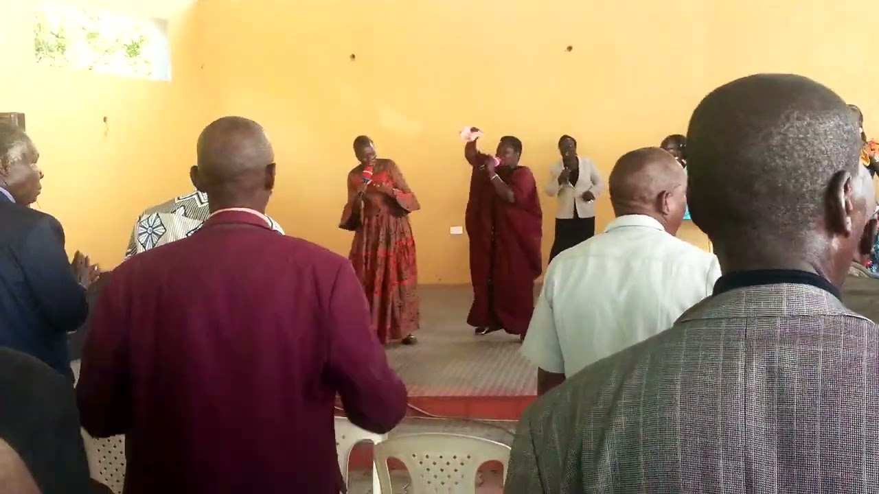 Linda Owino and Tabby Odanga leading praise.
