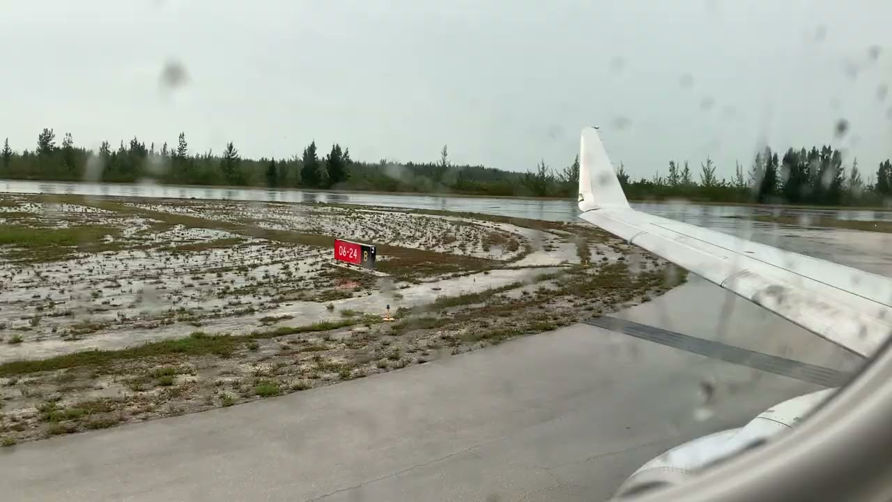American Eagle Embraer 175 Landing in Freeport, Bahamas