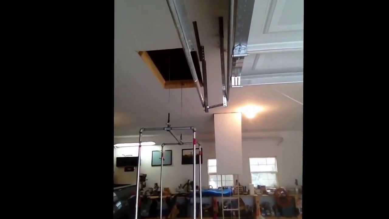 Garage attic lift