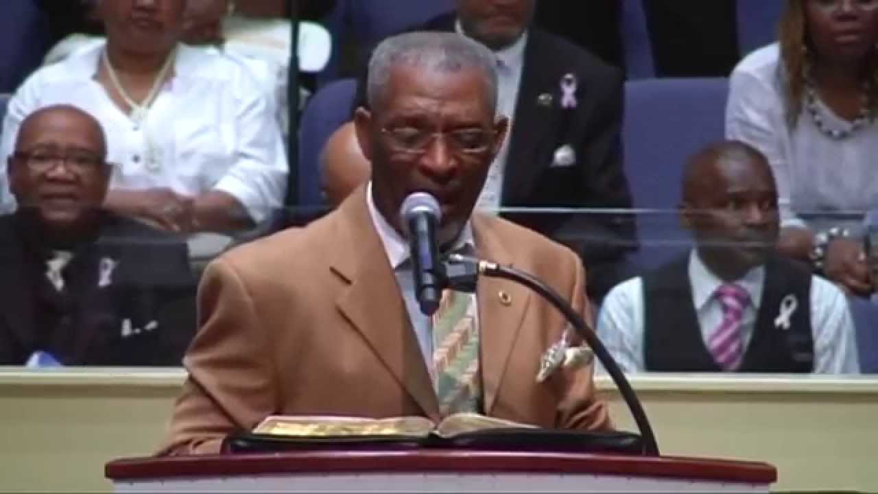 Pastor Micheal Benton preaches 
