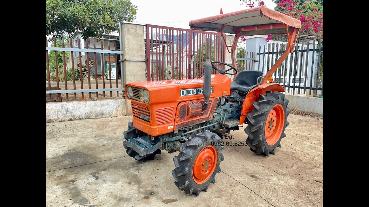 Kubota L2201DT + Mái che Lh 0962.69.6253