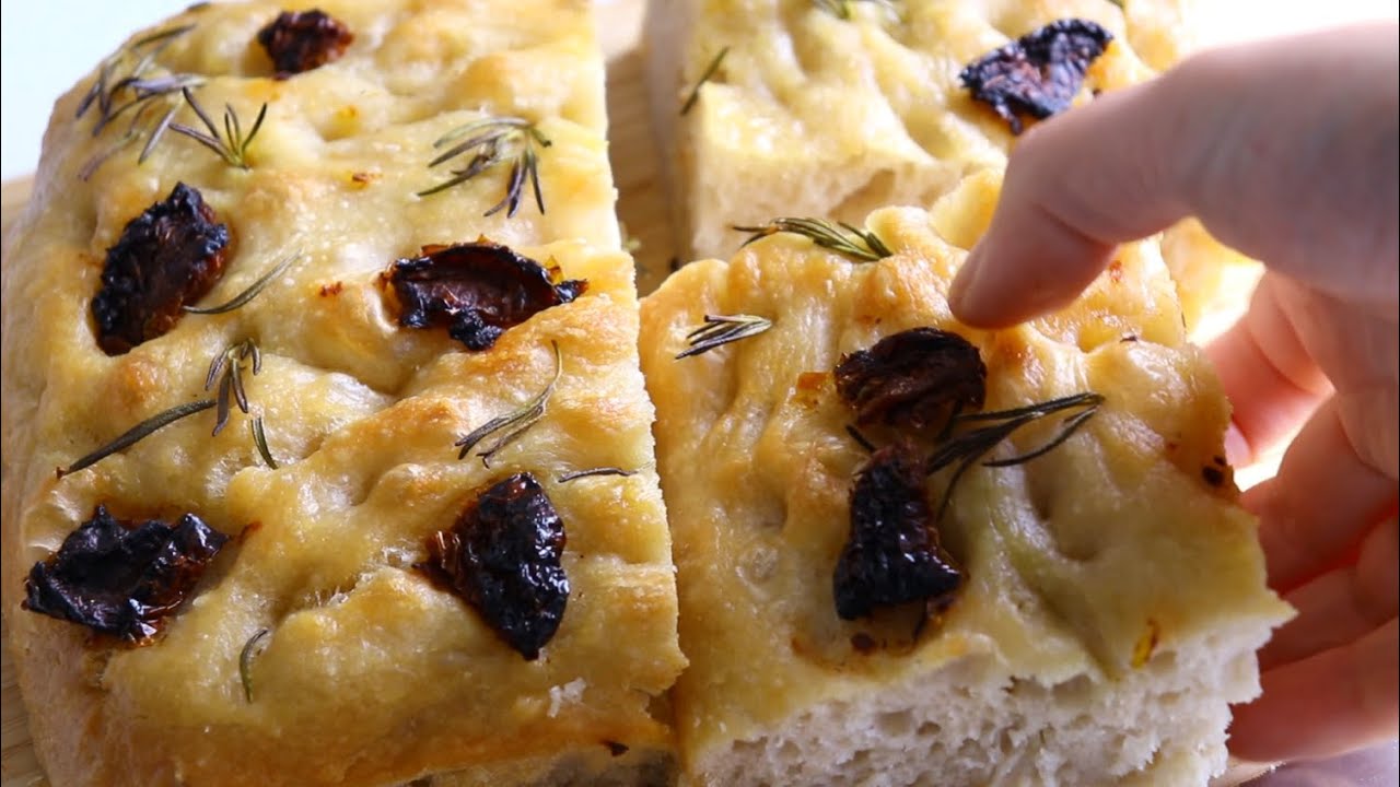 Soft and chewy Focaccia bread with sundried tomatoes and rosemary