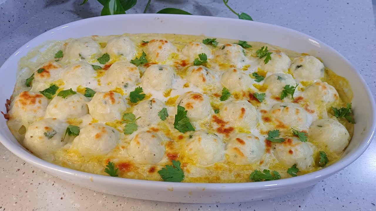 Potato Balls with Chicken and Creamy Bechamel Sauce