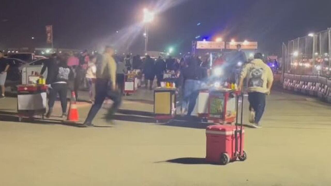 WATCH: Hot dog vendors run from officers outside EDC in Las Vegas