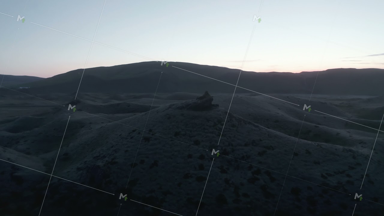 Moody drone view of foggy highlands in Iceland. Beauty on earth. Aerial view of sunset over desolate