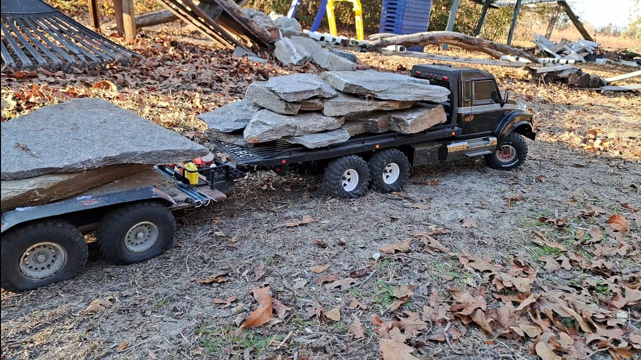 WE GOT ROCKS!  TRX6 HAULER WITH TRAILER HAULING BIG ROCKS FOR THE COURSE