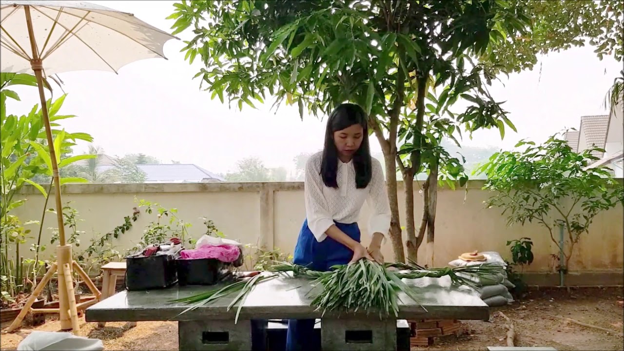 Making a scarecrow from a fallen palm leave :)