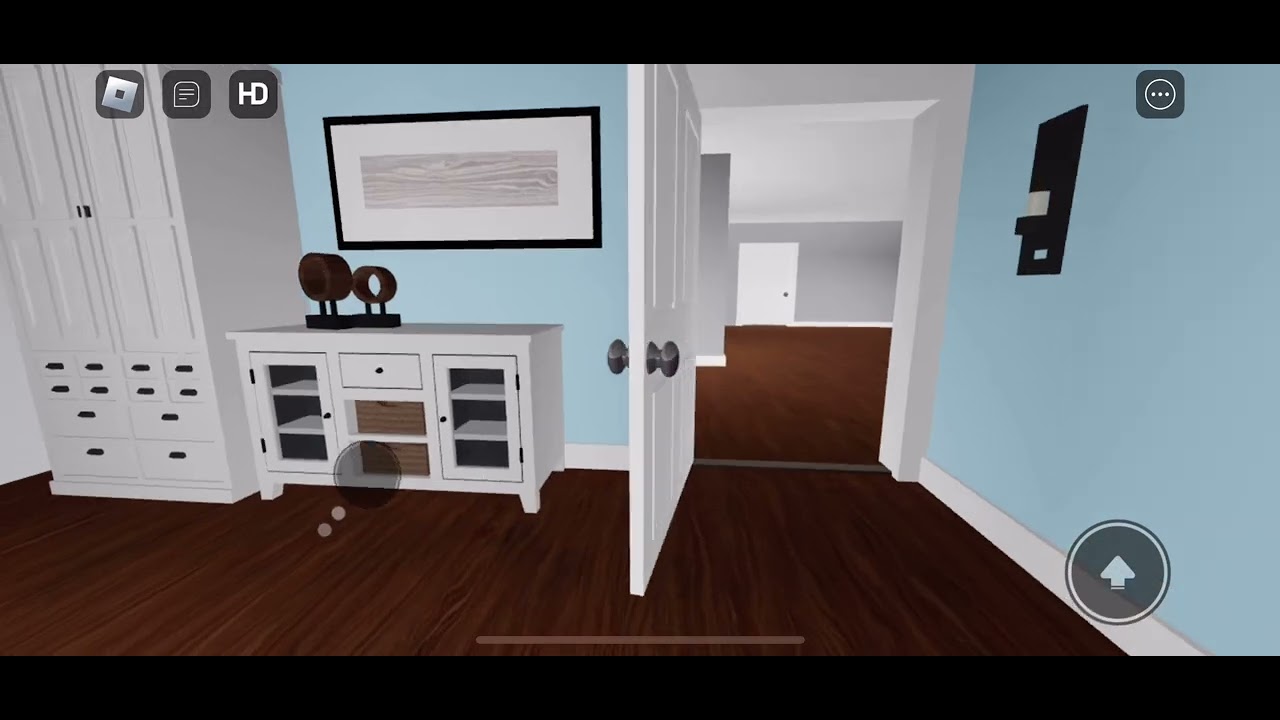 two houses and three buildings with air conditioners in Roblox ￼