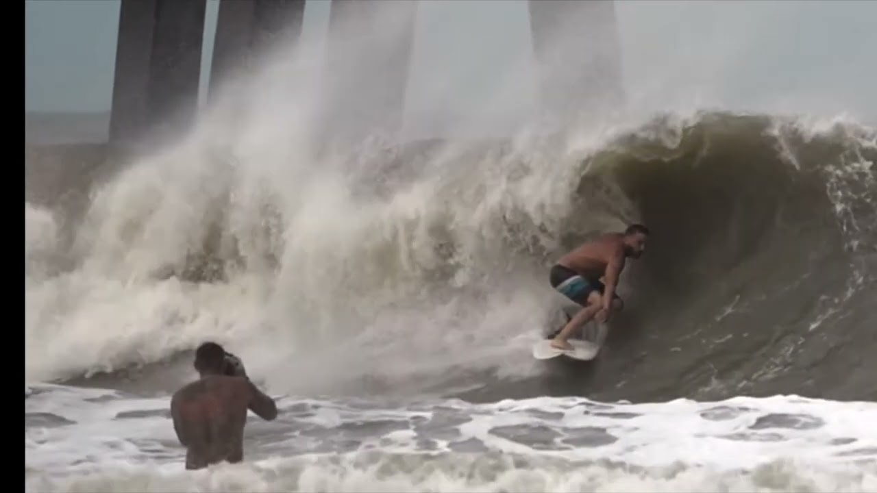 Jax Beach pier Surfing