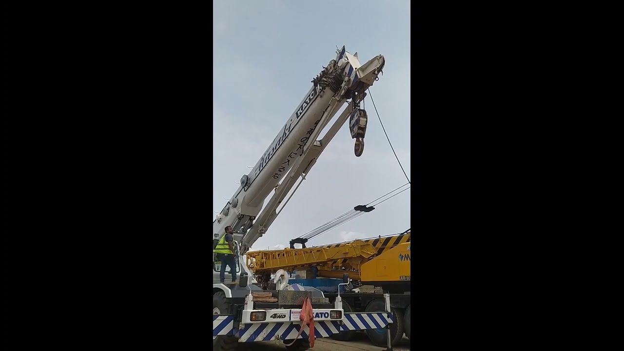 KATO 65 ton rough terrain  crane fly jib disassemble.