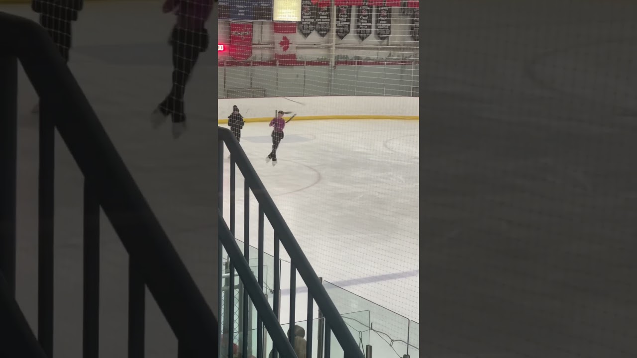 Double axel figure skating jump on harness