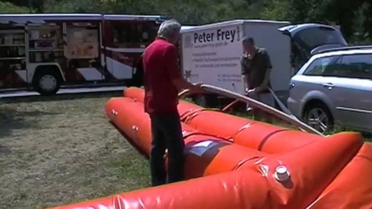 Beaver inflatable mobile flood barrier deployment