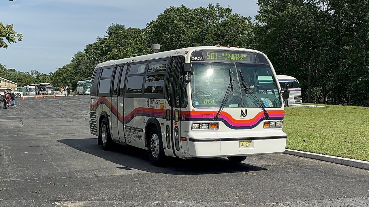 Multiple Vintage Buses From The NJ  Heritage Bus Festival Departing the Church Of Saint Veronica