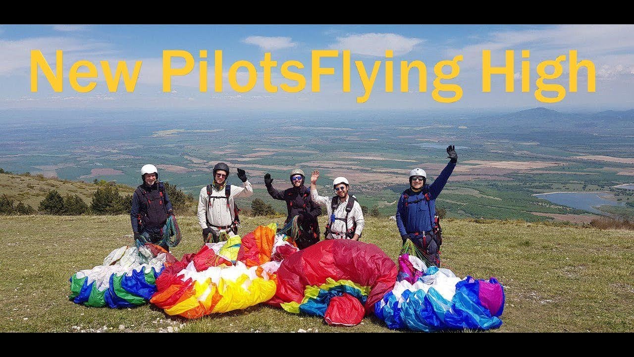 Newly Qualified Paraglider Pilots on their first flight after school