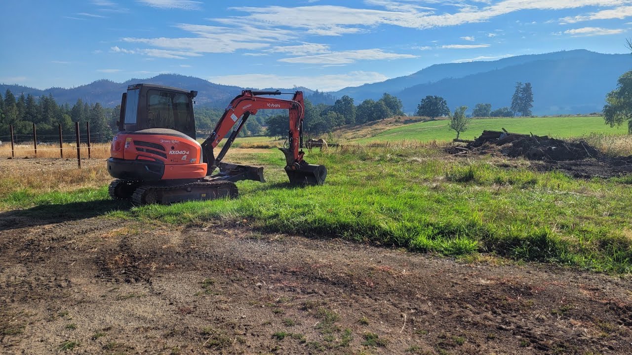 Cleanup and grading with the Kubota KX-040