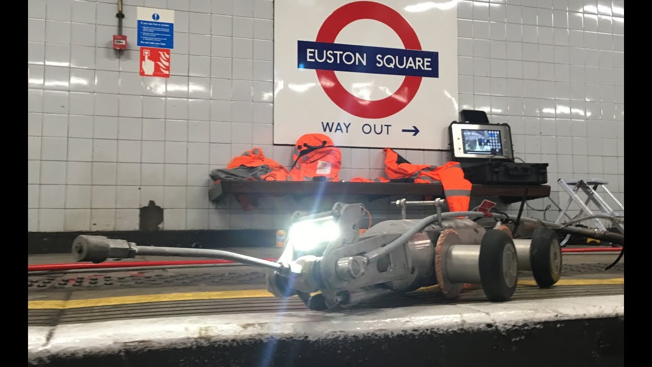 Concrete removal from sewer drain pipe underneath London Underground