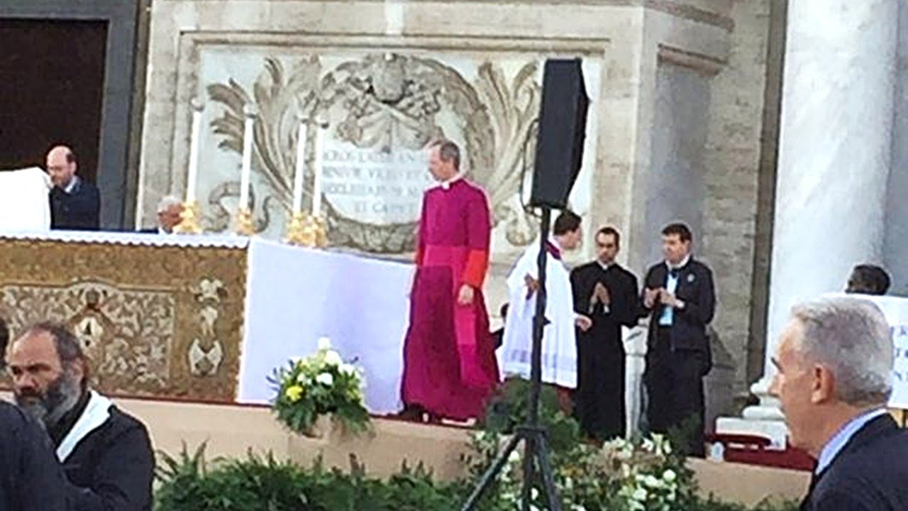 Mons. Marini checking up the arrangement of candlesticks