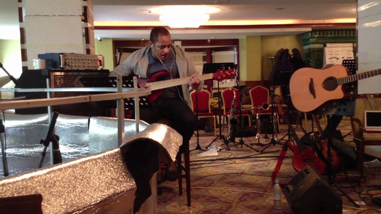 Ernest Tibbs-bass,Munyungo Jackson-percussion..Funky Jam)