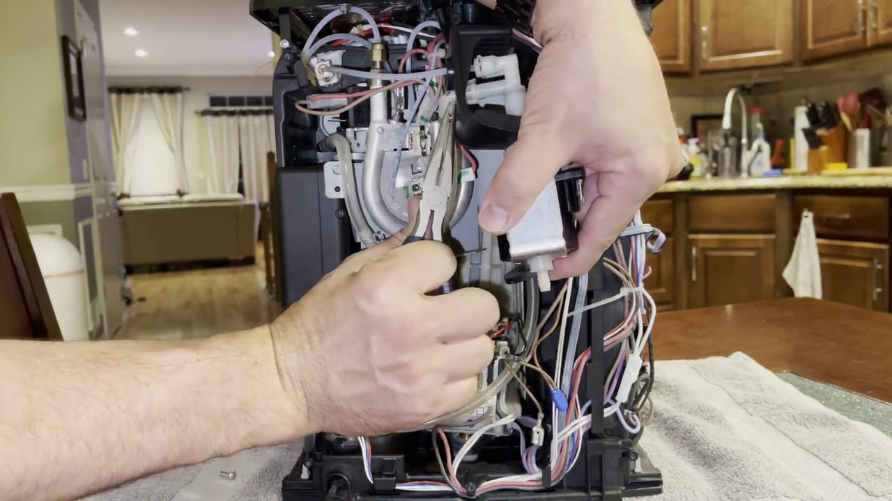 Delonghi Magnifica ESAM3300 Espresso machine water pump repair replacement fix  DIY Made Easy!