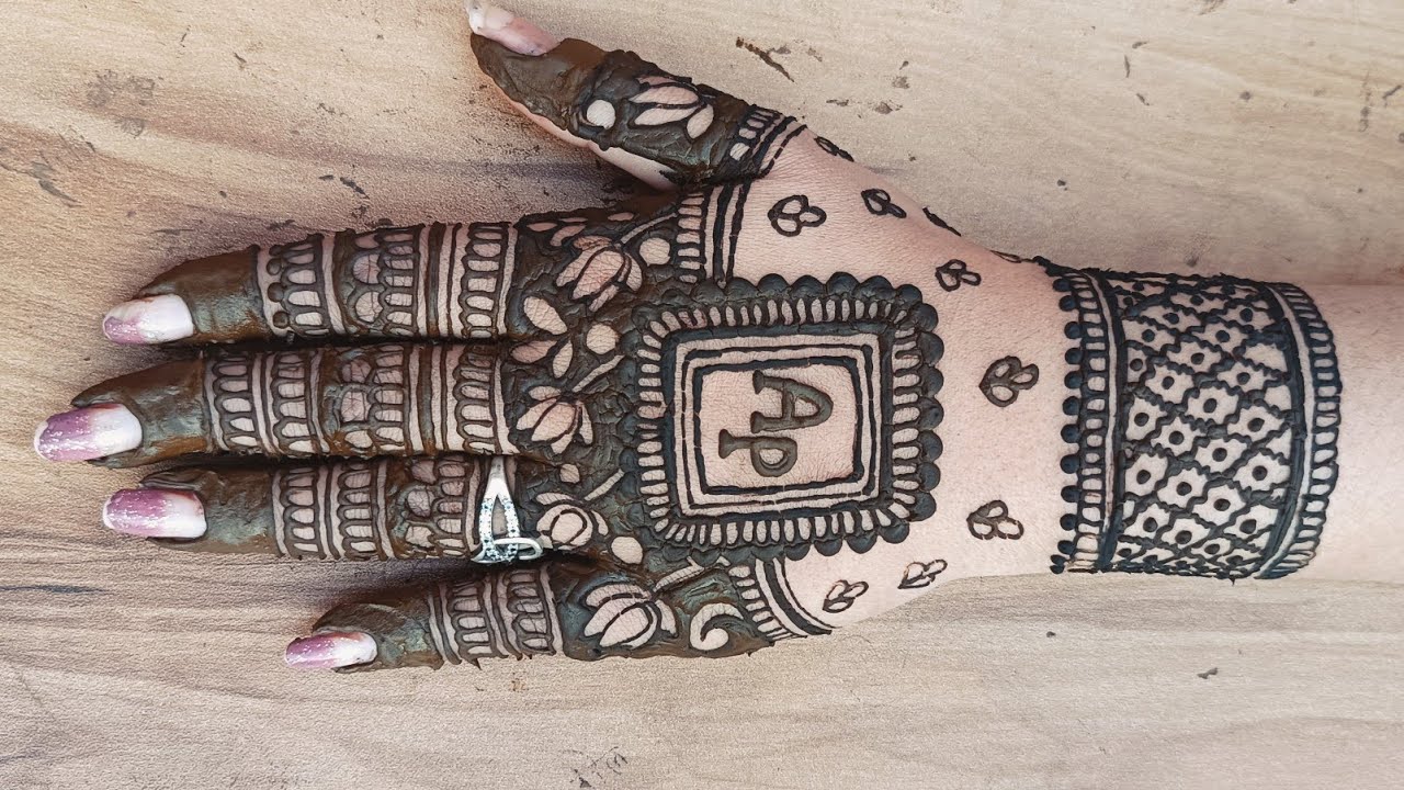 Beautiful letest beautiful mehandi back hand!back hand mehandi design #mehndidesign#namemehndidesign