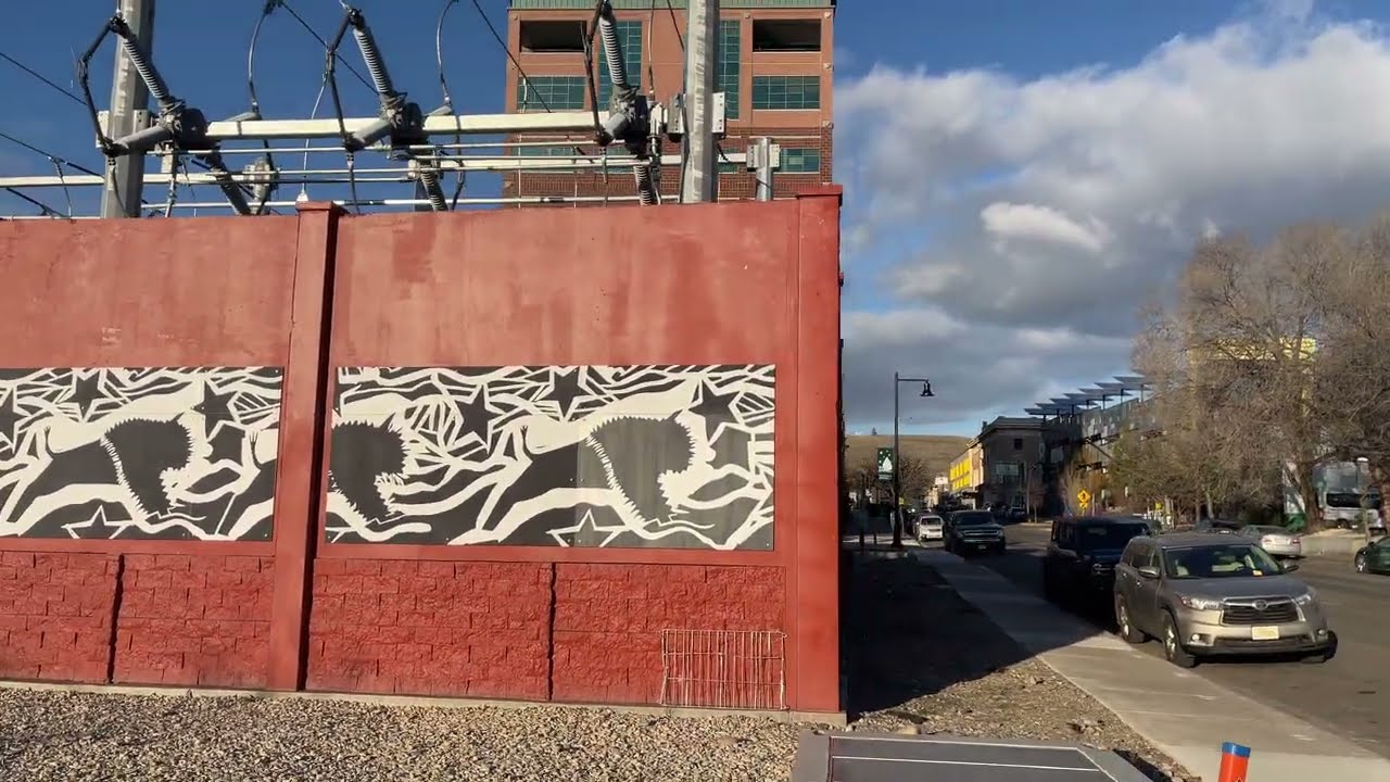 Large electric Substation, artistic walls with murals, quotes as well as Native American language
